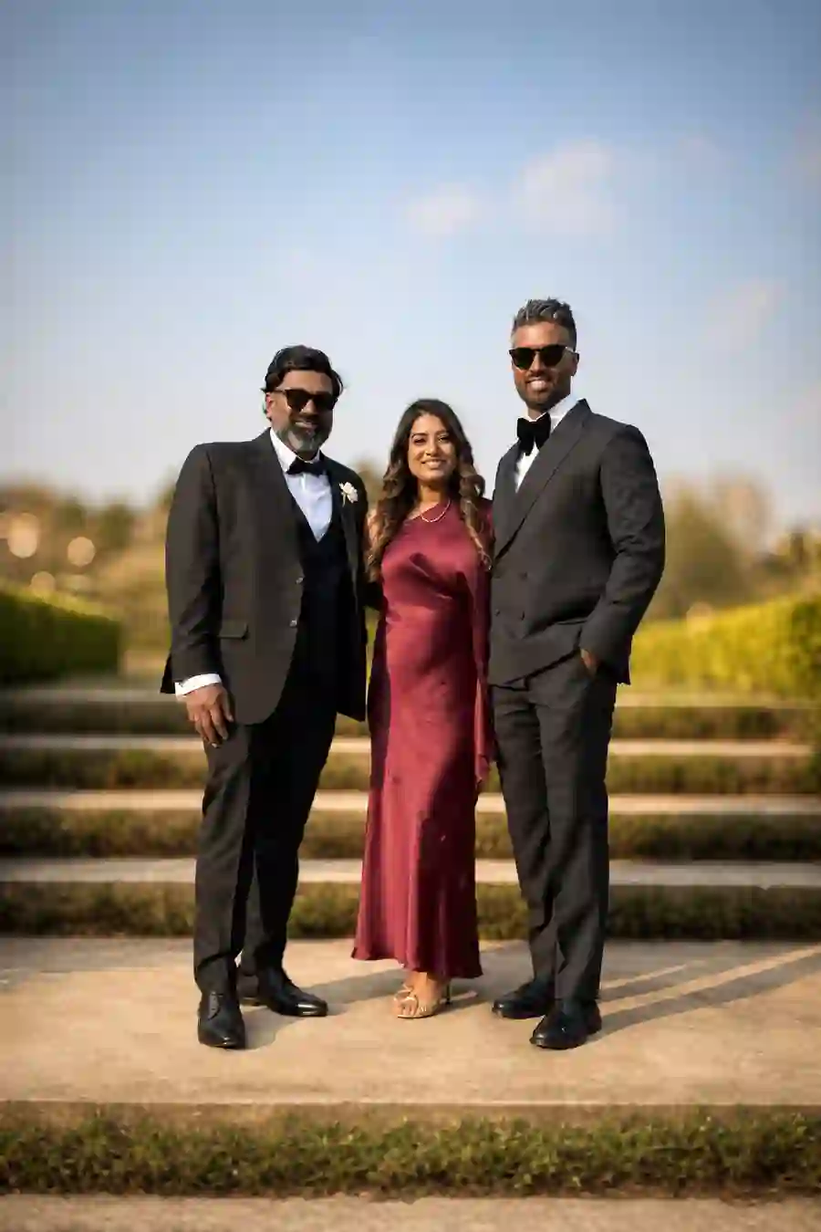 Glam Beauty AI print of three formally dressed guests from the instant printing kiosk