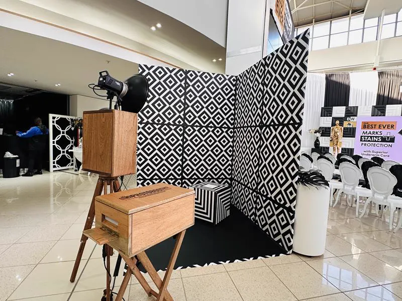 The Retrobooth beside a monochrome geometric backdrop at a shopping mall activation in Durban
