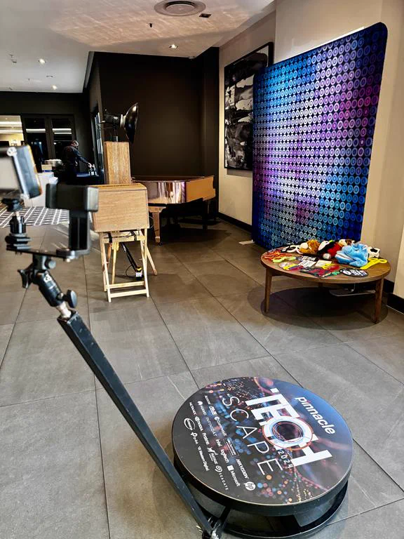 The branded Pinnacle TechScape SPIN360 platform and Retrobooth at a corporate conference in Durban