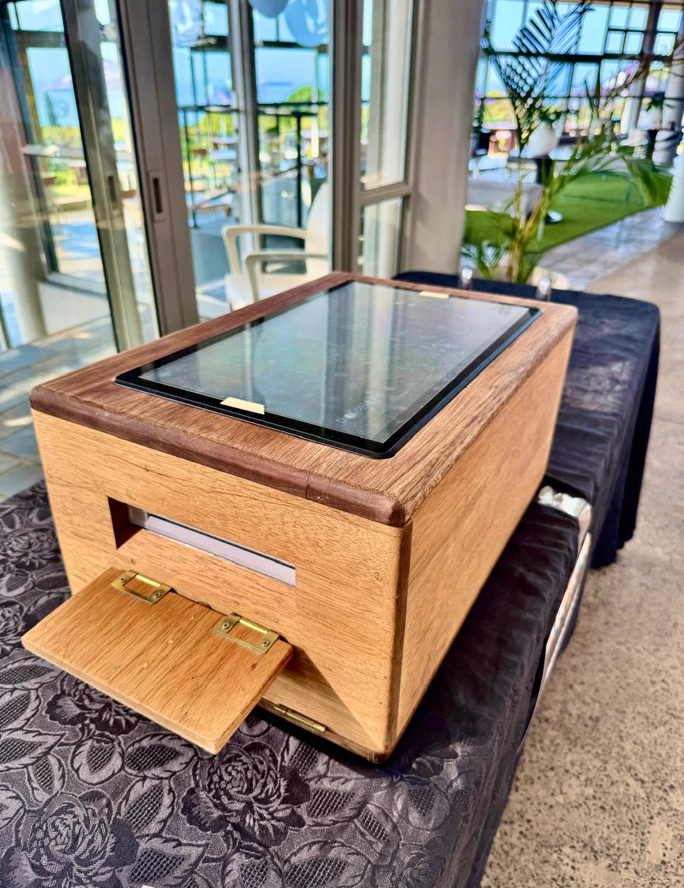 The Instant Printing Kiosk with its touchscreen and print tray open at a Durban event venue